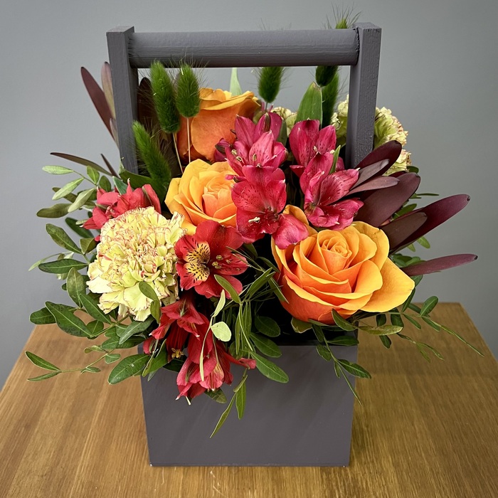 Цветы в ящике Пламя